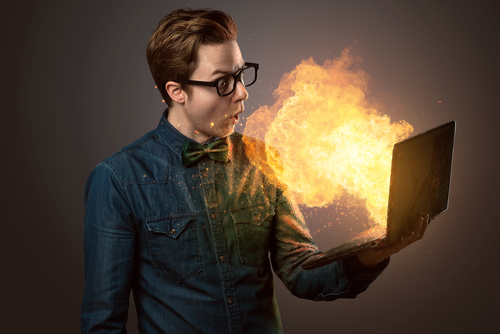 Nerdy Guy with an exploding Notebook