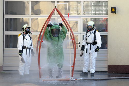  Firemen during decontamination after chemical intervention in Prague